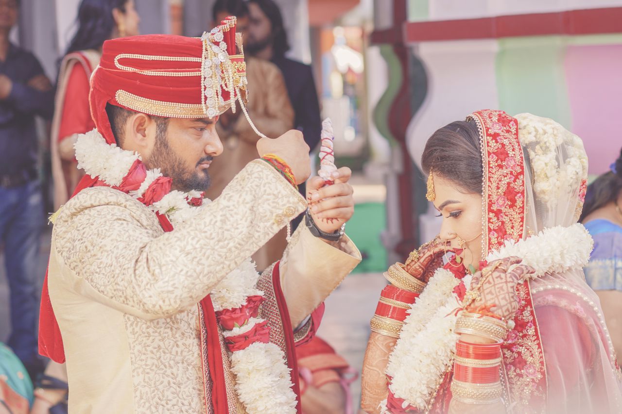gallery-6 A beautiful Indian couple at their wedding ceremony, showcasing love and tradition in Dehradun.
