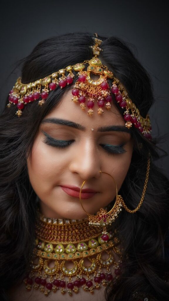 pexels photo 9157350 Close-up portrait of an Indian woman in traditional jewelry with closed eyes, showcasing cultural elegance.